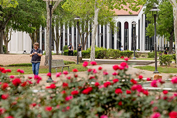 Students walking on campus. Links to Gifts from Retirement Plans
