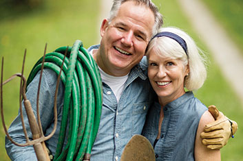 Photo of a man and woman doing yard work. Link to Life Stage Gift Planner Ages 60-70 Situations.