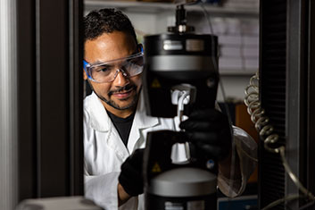 A student working on a machine. Links to Closely Held Business Stock