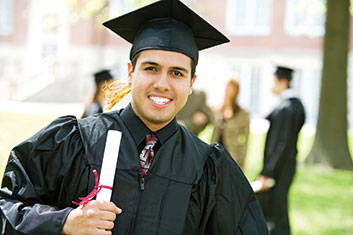 A student holding his diploma. Links to Gifts of Appreciated Securities
